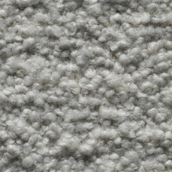 Smilla stretch fabric, muted gray looped pile, irregular texture with varying loop heights, Cierre1972 collection sample.